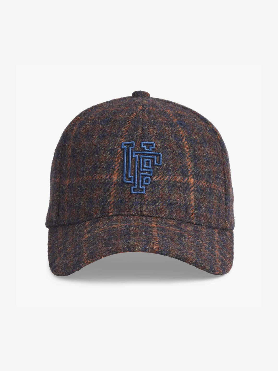 Upfront Lumber Jack baseball kasket i brun og navy med ternet mønster og blåt 3D-logo. 50% uld, 50% polyester og snapback. One Size.